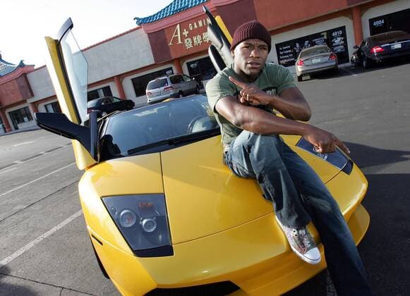 Floyd Mayweather Jr. (USA) und sein Lamborghini -  Boxen Herren Boxsport 2009, Profiboxen, Shooting, Einzelbild Las Vegas