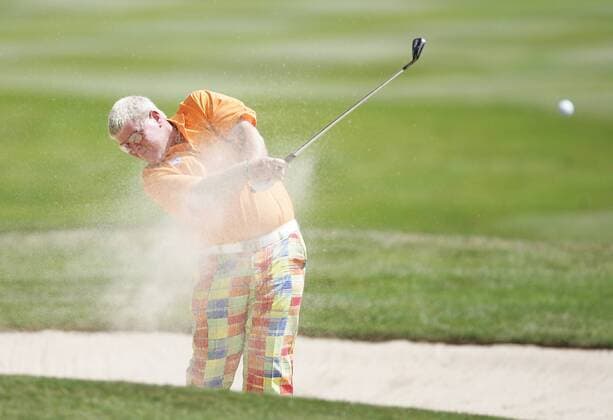 John Daly (USA) - EDITORIAL USE ONLY. No use with unauthorised audio, video, data, fixture lists, club league logos or live services. Online in-match use limited to 120 images, no video emulation. No use in betting, games or single club league player publications. Golf Herren BMW PGA Championship 2009, European Tour Einzelbild Virginia Water Wentworth Dynamik,