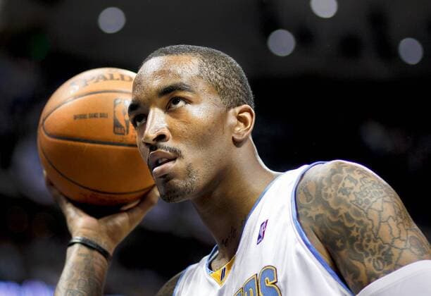 The Denver Nuggets J.R. Smith (#1) pauses with the ball after committing a foul against the Los Angeles Lakers during the first half of their NBA Western Conference Finals playoff basketball game at the Pepsi Center in Denver, Co. May 23, 2009. NBA: MAY 23 Western Conference Finals - Lakers at Nuggets - Game 4 Icon141090523017 EDITORIAL USE ONLY