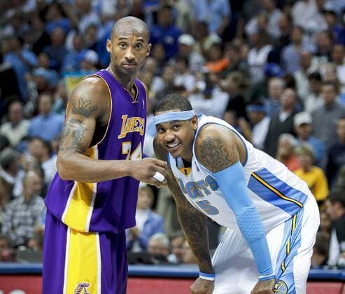 The Denver Nuggets Carmelo Anthony (#15) lines up against the Los Angeles Lakers Kobe Bryant (#24) on an inbound play during the second half of Game 4 of the NBA Western Conference Finals in Denver May 25, 2009. The Nuggets won the game 120-101 to even the series at 2-2. The two teams best players guarded each other at times in the game. NBA: MAY 25 Western Conference Finals - Lakers at Nuggets - Game 4 Icon141090525029 EDITORIAL USE ONLY