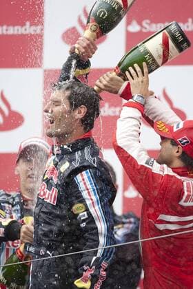 Siegerehrung Großer Preis von Deutschland 2009: Sieger Mark Webber (Australien Mitte), Sebastian Vettel (Deutschland, li. beide Red Bull) und Felipe Massa (Brasilien Ferrari) bei der Sektdusche -  Motorsport Grand Prix Herren Großer Preis von Deutschland 2009, Formel 1 Weltmeisterschaft, F1, F, GP, WM Gruppe Nürburgring Nürburg Freude,