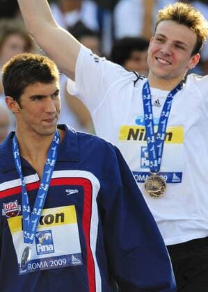 Paul Biedermann (R) of Germany and Michael Phelps of USA react during the awarding ceremony of the Men s 200m Freestyle Final. Paul Biedermann broke the world record with 1:42.00 to win the gold medal and Michael Phelps won the silver medal with 1:43.22. 