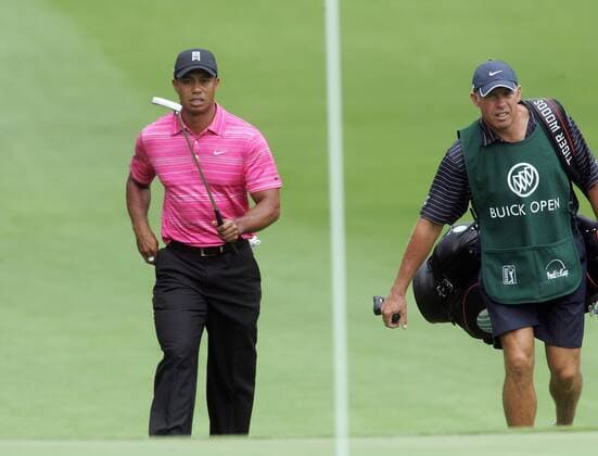 Tiger Woods (USA) and his caddy Steve Williams walk a fairway in round one of the Buick Open PGA Tour Icon46520090730097 o0 Eldrick EDITORIAL USE ONLY
