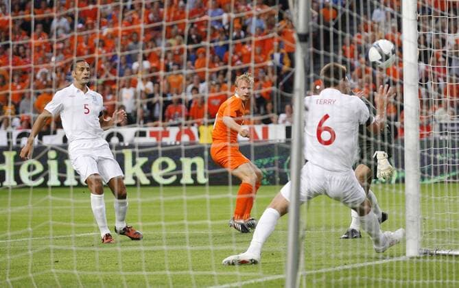 Holland s Dirk Kuyt scoring his sides opening goal EDITORIAL USE ONLY. No use with unauthorised audio, video, data, fixture lists, club league logos or live services. Online in-match use limited to 120 images, no video emulation. No use in betting, games or single club league player publications. o0 England, Tor, Treffer, Gegentor,