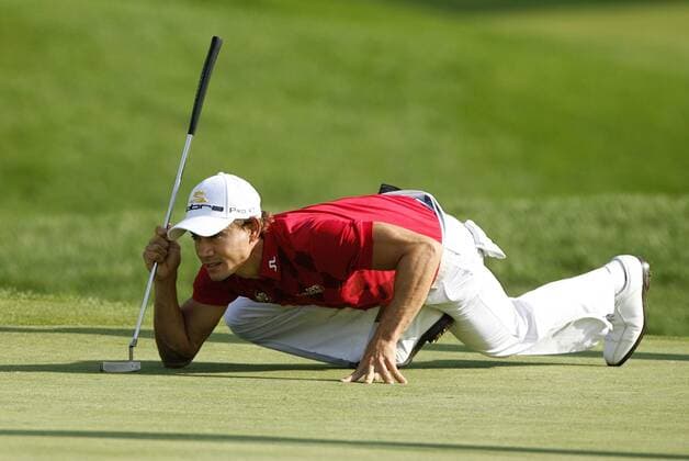 Camilo Villegas of Colombia lines up his putt on the 11th green during the PGA Championship  BKX2009081320