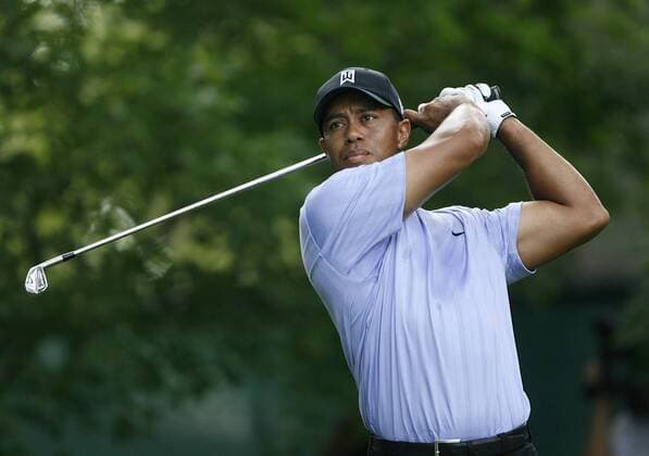 Tiger Woods (USA)tees off on the 14th hole during the first round of the 91st PGA Championship at Hazeltine National Golf Club in Chaska, Minnesota on August 12, 2009.  BKX2009081301 o0 Eldrick