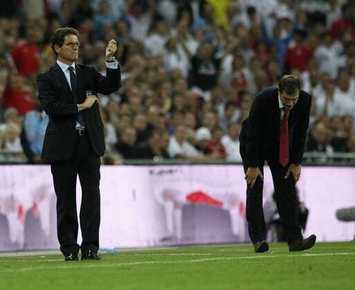 Nationaltrainer Fabio Capello (England, li.) und Trainerkollege Slaven Bilic (Kroatien) EDITORIAL USE ONLY. No use with unauthorised audio, video, data, fixture lists, club league logos or live services. Online in-match use limited to 120 images, no video emulation. No use in betting, games or single club league player publications. o0 Trainer