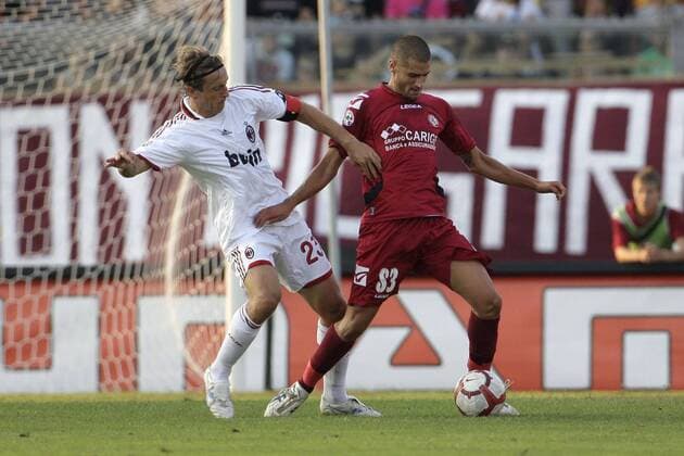 Livorno 12 09 2009 - Serie A AC Livorno (red) - AC Milan Antonio Candreva (R) - Massimo Ambrosini 