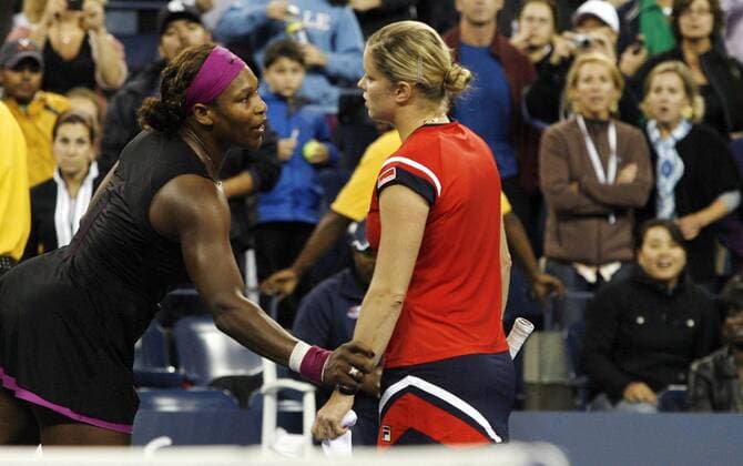 Serena Williams of the USA (L) grabs the arm of Kim Clijsters of Belgium after their semifinal match  NYP20090912135 o0 Flushing Meadows