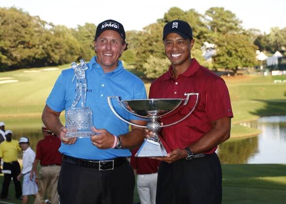 Phil Mickelson (l.) and Tiger Woods (both USA) stand with their trophies in the final round of the FedEx Cup - The Tour Championship in Atlanta - Mickelson won The Tour Championship finishing at 9 under. Woods won the Fed Ex Cup - Icon4880909270626 EDITORIAL USE ONLY