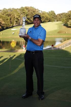 Phil Mickelson (USA) stands with his Tour Championship trophy in the final round of the FedEx Cup in Atlanta - Icon4880909270630 EDITORIAL USE ONLY