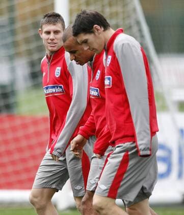 England s James Milner (L), Gabriel Agbonlahor (M) and Gareth Barry EDITORIAL USE ONLY. No use with unauthorised audio, video, data, fixture lists, club league logos or live services. Online in-match use limited to 120 images, no video emulation. No use in betting, games or single club league player publications.