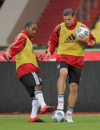 MOSCOW, Players of German National Team, Cacau (L) and Lukas Podolski hold a training session  RE0BFFA8