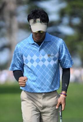 International team member Ryo Ishikawa celebrates after making a putt for birdie on the 2nd green during the second round of The Presidents Cup at Harding Park Golf Course in San Francisco, California on October 9, 2009.  SFP20091009313 o00 The President s