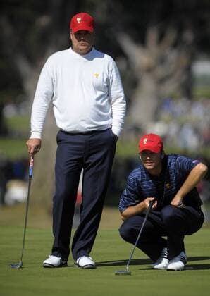 United States team members Sean O Hair (R) and Kenny Perry lines up a putt on the 9th hole during the second round of The Presidents Cup at Harding Park Golf Course in San Francisco, California on October 9, 2009.  SFP20091009356 o0 USA, Ohair o00 The President s