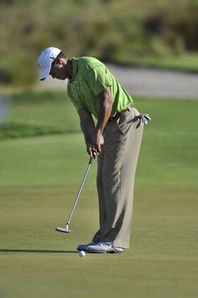 TIGER WOODS (USA) puts during practice. - ZUMAmm5