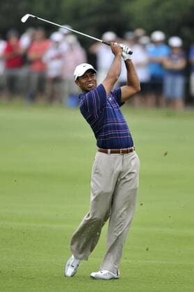 Nov 12, 2009 - Melbourne, Australia - TIGER WOODS (USA) appears a little unsure of his second shot on the Par 4 second hole during the Australian Masters at Kingston Heath Golf Club - ZUMAmm5 o0 Eldrick