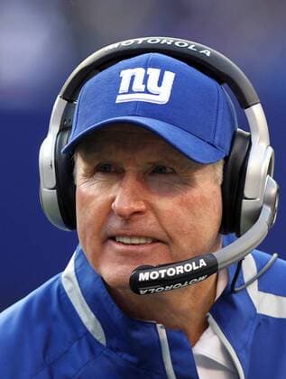 New York Giants head coach Tom Coughlin reacts after Eli Manning throws a 3 yard touchdown pass in the fourth quarter against the Atlanta Falcons in week 11 of the NFL season at Giants Stadium in East Rutherford, New Jersey on November 8, 2009. The Giants defeated the Falcons 34-31 in overtime.  NYP20091122111