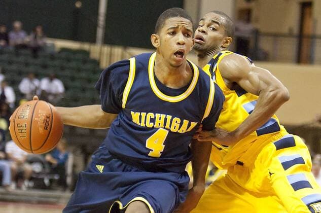 Nov. 27, 2009 - Lake Buena Vista, FL, United States of America - November 27, 2009: Marquette guard David Cubillan (10) defends Michigan guard Darius Morris (4) during game action at the Old Spice Classic between Michigan Wolverines and the Marquette Golden Eagles. Marquette defeated 15 Michigan 79-65 at Disney Wide World of Sports Milk House in Lake Buena Vista, Fl. - ZUMAcg2