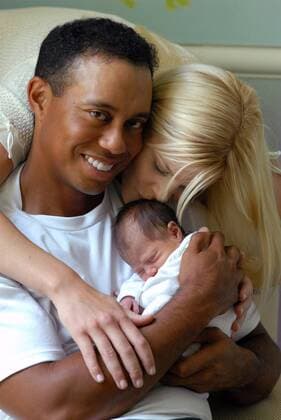Jun 27, 2007 - Miami, FL, USA - TIGER WOODS (L) and ELIN WOODS with their new daughter, SAM ALEXIS WOODS - at a private residence in Florida on June 23, 2007. The world s top-ranked golfer became a father for the first time, one day after tying for second at the US Open. His wife, Swedish model Elin Nordegren, gave birth to the girl, named Sam Alexis Woods. Now, Tiger Woods new-born daughter has appeared in front of the cameras for the first time, and Woods has released photos on his website. PICTURED: Tiger Woods and Elin Woods with their daughter, Sam Alexis Woods. - ZUMAz03 o0 USA