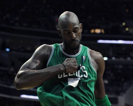 Boston Celtics Kevin Garnett reacts after dunking against the Washington Wizards during the first quarter at the Verizon Center in Washington on December 10, 2009.  WAP20091210709