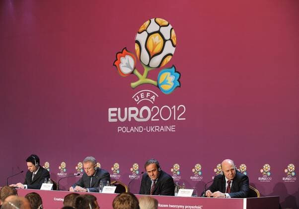 Kiev, Ukraine 14 12 2009 EURO 2012 logo nad slogan - Creating History Together first shown at a press conference in Kiev. In the picture: FFU president Grigoriy Surkis (UKR, 2L), UEFA president Michel Platini (France, 2R) and PZPN president Grzegorz Lato (Poland, R) -  EN_00298592_023 o0 Funktionär