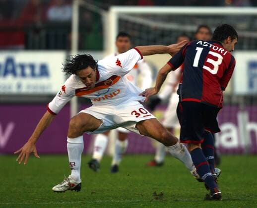 Cagliari Calcio (rot) - AS Rom (weiß) Luca TONI (L) - ginoxmancini