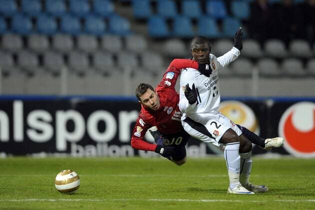 OSC LILLE (rot) - STADE RENNES (weiß) - 13.01.2010 - COUPE DE LA LIGUE - Ludovic OBRANIAK (L) Lucien AUBEY - 
