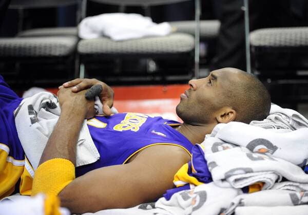 January 13, 2009: Los Angeles Lakers guard Kobe Bryant 24 lays on his back after being removed from a game the previous night for back spasms during an NBA game between the Los Angeles Lakers and the Dallas Mavericks at the American Airlines Center in Dallas, TX Los Angeles defeated Dallas 100-95 Icon20100113559 EDITORIAL USE ONLY