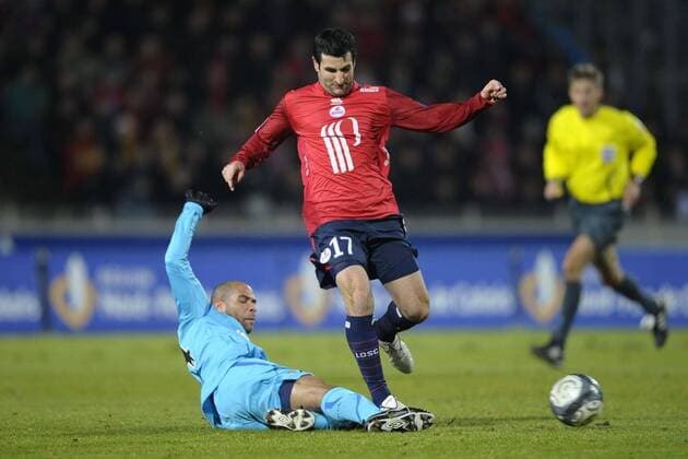 OSC LILLE (Rot) vs RC LENS (Blau): - L1 - 30.01.2010 - DUEL Pierre-Alain Frau r. vs Eric Chelle JBAUTISSIER 