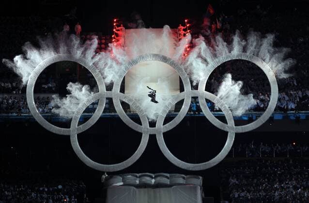 (100212) -- VANCOUVER, Feb. 12, 2010 () -- A snowboard athlete jumps over the Olympic rings on the opening ceremony for the 2010 Winter Olympic Games inside the BC Place stadium in Vancouver on Feb. 12, 2010. -  o0 Ringe Olympiaringe Objekte o0 Kanada