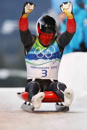 German luge athlete Felix Loch celebrates a gold medal performance in the men s luge at The Whistler Sliding Centre course in Whistler, BC at the 2010 Vancouver Olympic Games, Sunday February 14, 2010. - - ZUMAw51 o0 Jubel, Freude Olympiasieg Sieg