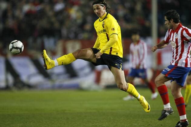 Atletico Madrid (red) vs FC Barcelona (yellow) - Zlatan Ibrahimovic (Barcelona)-Antonio Lopez(Atletico)  (0000013072)