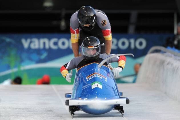 Andre LANGE, Kevin KUSKE (GER), Bob GER1, Aktion, Start, Zweierbob, Bobsleigh, Two Man, 20.02.2010. XXI. Olympische Winterspiele 2010, vom 12.02. - 28.02.2010 in Vancouver Kanada. o0 Start, starten, Startsituation