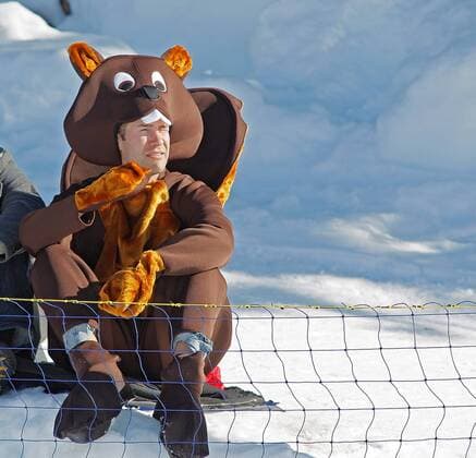 A man in a beaver costume watches the women s 15 km cross country individual sprint on day 8 of the 2010 Vancouver Winter Olympics at Whistler Olympic Park.  RE0C8CAC o0 Fan kurios KostÃ¼m Biber
