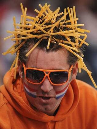 Feb. 20, 2010 - Richmond - 2 20 10 - RICHMOND - Fans from The Netherlands all dressed up for Men s 1500 m Long Track speed skating at the Richmond Oval part of Vancouver 2010 Winter Olympic Games hosted by Vancouver. ---  - ZUMAt14 o0 Zuschauer Porträt Strohhalm Strohhalme Kopfschmuck kurios