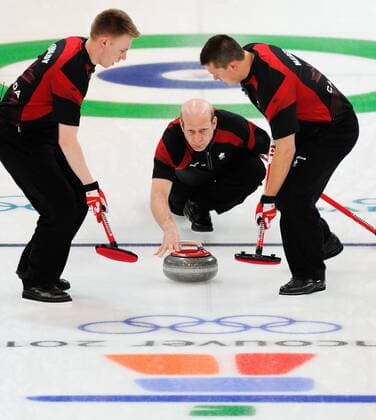 (100227) -- VANCOUVER, Feb. 27, 2010 () -- Canada s Kevin Martin (C) throws the stone during the men s curling final against Norway at the 2010 Winter Olympic Games in Vancouver Olympic Centre, Vancouver, Canada, Feb. 27, 2010. 