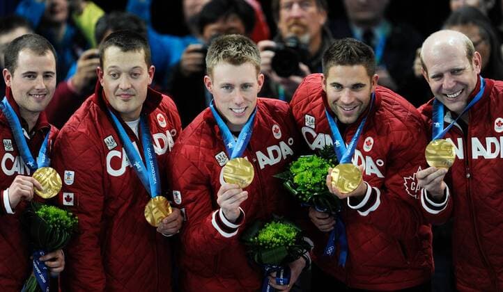 (100227) -- VANCOUVER, Feb. 27, 2010 () -- Canadian players ( Skipp Kevin MARTIN (R) with John MORRIS, Marc KENNEDY, Ben HEBERT, Adam ENRIGHT) pose during the victory ceremony for the men s curling event at the 2010 Winter Olympic Games in Vancouver Olympic Centre, Vancouver, Canada, Feb. 27, 2010. Canada won the gold medal.  o0 Sieg Olympiasieg Jubel Freude Goldmedaille