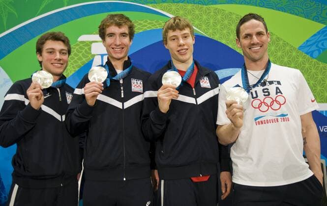 Feb 27, 2010 - Vancouver, British Columbia, Canada - USA s Team Pursuit Speed Skaters TREVOR MARSICANO, JONATHAN KUCK, BRIAN HANSEN, CHAD HEDRICK (L-R) after winning their silvermedal in the Men s Team Pursuit speed skating competition during the 2010 Winter Olympic Games in Vancouver. - ZUMAf72 o0 Teamwettbewerb Silber Medaille Silbermedaille