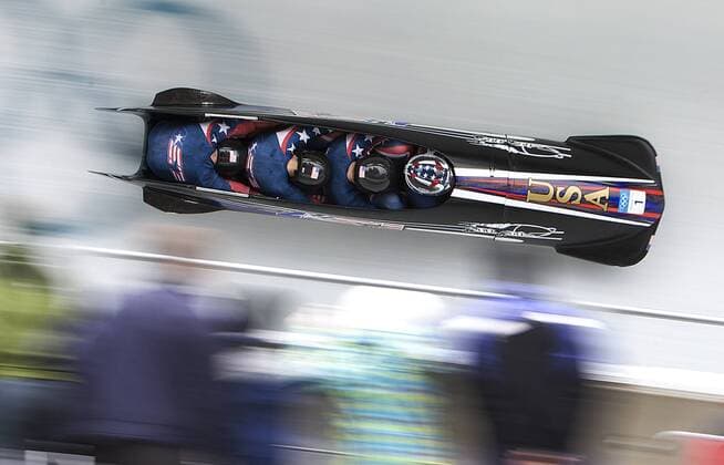 Whistler, BC, Canada - WHISTLER, BC: FEBRUARY 27, 2010 -- USA 1 s four man bobsleigh rips down The Whistler Sliding Centre course during the third round, in Whistler, BC, during the 2010 Olympic Games, Saturday February 27, 2010. - ZUMAw51