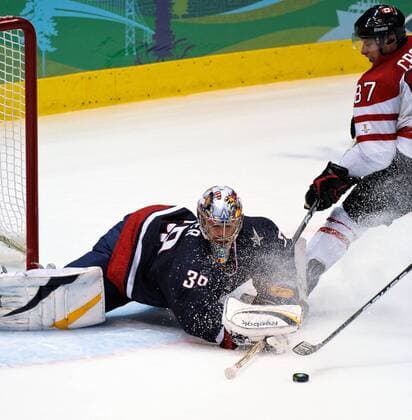 Ryan Miller (L) of the USA saves the shooting by Sidney Crosby of Canada during the men s icehockey goldmedalgame at the 2010 Winter Olympic Games in Canada Hockey Place, Vancouver, Canada, Feb. 28, 2010. . (9) 