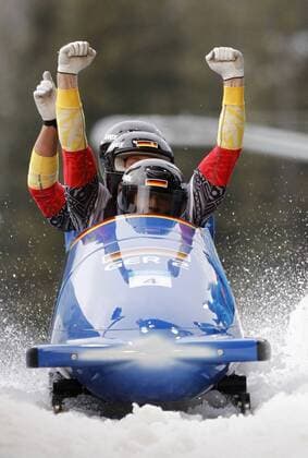 Germany s Thomas Florschuetz, Ronny Listner, Richard Adjei and Andreas Barucha compete in the four-man bobsleigh event at the 2010 Winter Olympics in Whistler, Canada on February 27, 2010.  BKX2010022717 o0 Jubel Freude