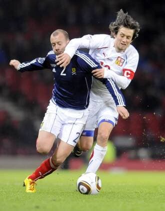 Mar 03, 2010 - Edinburgh, Scotland - International football. Scotland (blue) versus Czech Republic (white), at Hampden Park, Glasgow. Scotland s Alan Hutton and Czech s Tomas Rosicky  - ZUMAts3