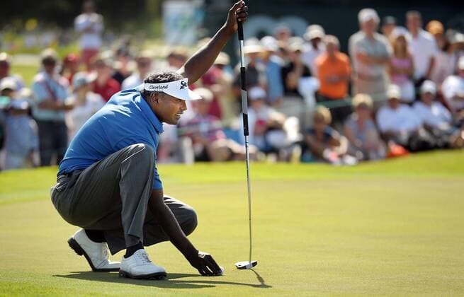 Mar. 14, 2010 - Doral, FL - Florida, USA - United States - Doral---fl-doral-golf-0314m----Action from the final round of the CA Championship at the Doral Golf Resort and Spa. Vijay Singh (Fiji) lines up a putt at the 9th green. - ZUMAss5 o0 Inseln