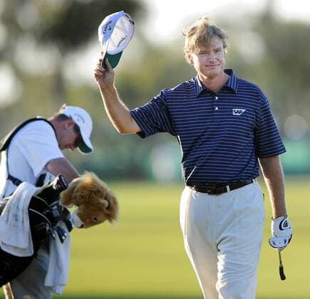 Mar. 14, 2010 - Doral, FL - Florida, USA - United States - Doral---fl-doral-golf-0314e----Action from the final round of the CA Championship at the Doral Golf Resort and Spa. Champion Ernie Els, of South Africa, tips his cap to the crowd at the 18th green as he approaches for his championship putt. - ZUMAss5 o0 Südafrika