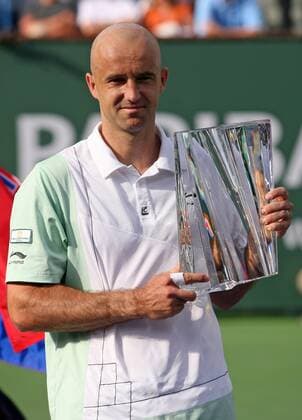 21 March 2010: Ivan Ljubicic of Croatia holds the winner s trophy during the finals of the BNP Paribas Open at the Indian Wells Tennis Garden in Indian Wells, CA. Icon479000194 o0 Jubel Freude Sieg Pokal Trophäe EDITORIAL USE ONLY