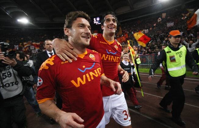 27-03-2010 Roma Italy, AS Rom (rot) vs Inter Mailand (schwarz blau), Italian Serie A : Francesco Totti - Luca Toni (re., beide AS Rom) - 