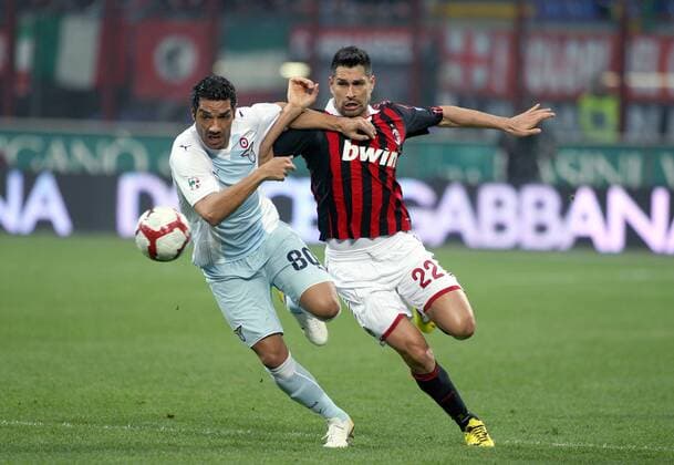Marco Borriello (AC Milan, re.) - Andre Dias (Lazio Rom)