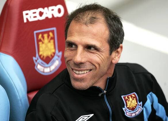 Coach Gianfranco Zola of West Ham United prior to kick off --- Premier League 2009 2010 - West Ham United (red) vs Wigan Athletic (blue) --- EDITORIAL USE ONLY. No use with unauthorised audio, video, data, fixture lists, club league logos or live services. Online in-match use limited to 120 images, no video emulation. No use in betting, games or single club league player publications.