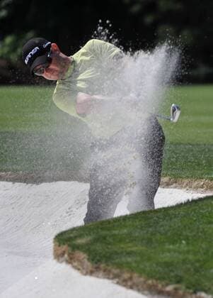 Rory Sabbatini RSA hits out of a bunker on the 4th fairway during the second round of the Quail Hollow Tournament in Charlotte, North Carolina on April 30, 2010.  CHA20100430308